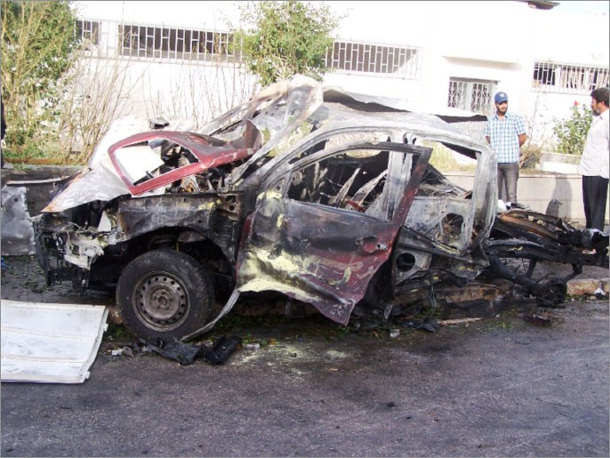 Wrak samochodu, z którego odpalono ładunek w Benghazi - fot. al-Jazeera