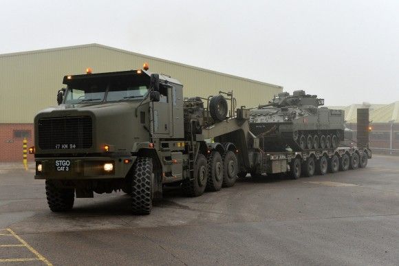 Heavy Equipment Transporters were used to bring Challenger tanks and Warrior IFVs (pictured above) to exercise Black Eagle in Poland. Photo: British Army.