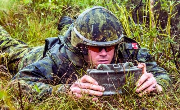 A Canadian soldier sets up a claymore explosive device at the firing range in Glebokie, Poland June 23, 2015 during Operation REASSURANCE. Photo: Corporal Precious Carandang, 8 Wing Trenton, http://www.forces.gc.ca