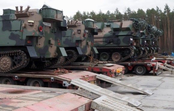 Command/command staff vehicles and Krab howitzers, ready to be shipped. Image Credit: Jerzy Reszczyński