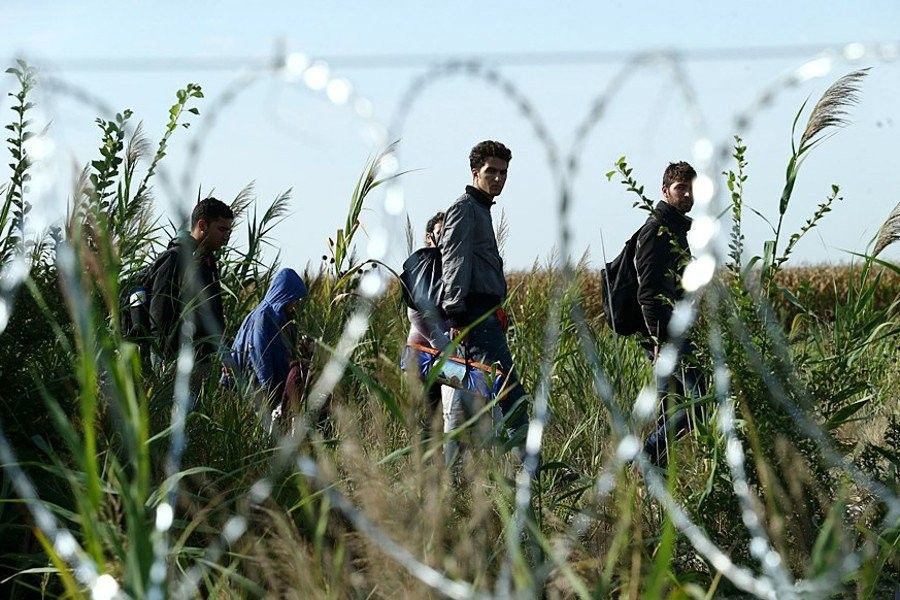 How is Russian intelligence manipulating the migration crisis in Europe?