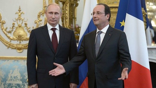 Prezydenci Rosji i Francji podczas obchodów rocznicy lądowania w Normandii w czerwcu 2014 roku. Fot. kremlin.ru.