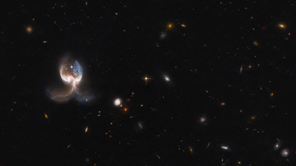 Dwie łączące się galaktyki w układzie VV689