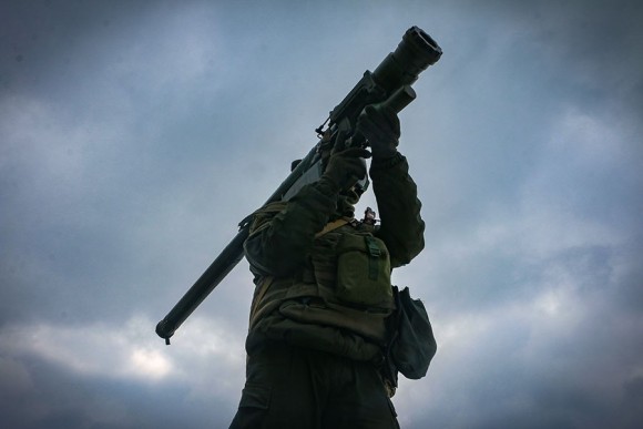Ukrainian National Guard soldier, yielding a Piorun system.