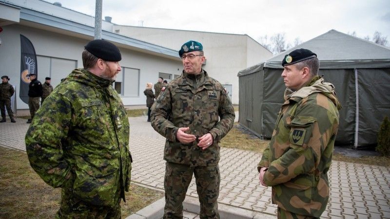 General Piotrowski, with Canadian and Norwegian officers, visiting Świętowszów.