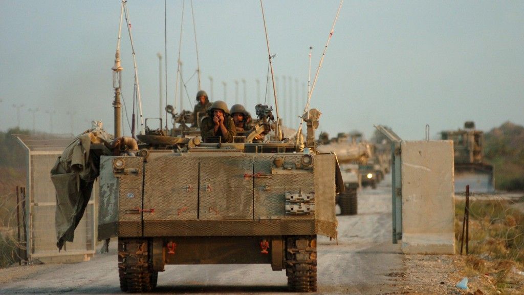 Izraelski M113 podczas działań w Stefie Gazy.