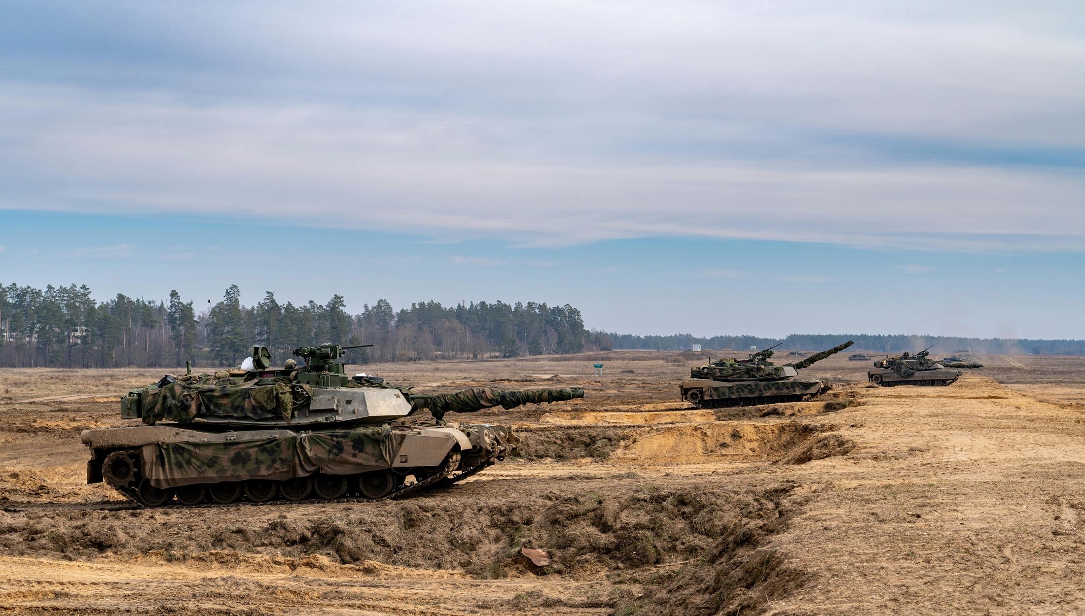 Thursday media review; Putin rescued NATO; Services scrutinize contract for more than 1 billion zlotys.