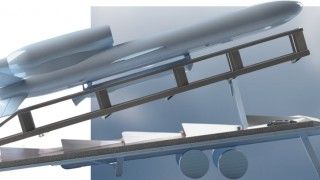 Wizualizacja pocisku manewrującego Milanion FP-5 na wyrzutni umieszczonej na naczepie samochodowej.