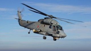 Odlot śmigłowca od fregaty.