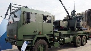 Rozgrzewką do zakontraktowanego w styczniu, dopracowanego, systemu SAN było kilka opracowań o charakterze demonstratorów technologii, jak system AG-35/A-35 zintegrowany z podwoziem Jelcz z początku trzeciej dekady lat 2000.