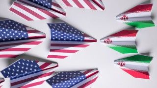 paper-airplanes-with-flags-forming-opposing-sides-2026-01-05-06-10-08-utc