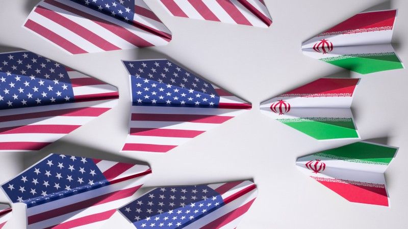 paper-airplanes-with-flags-forming-opposing-sides-2026-01-05-06-10-08-utc