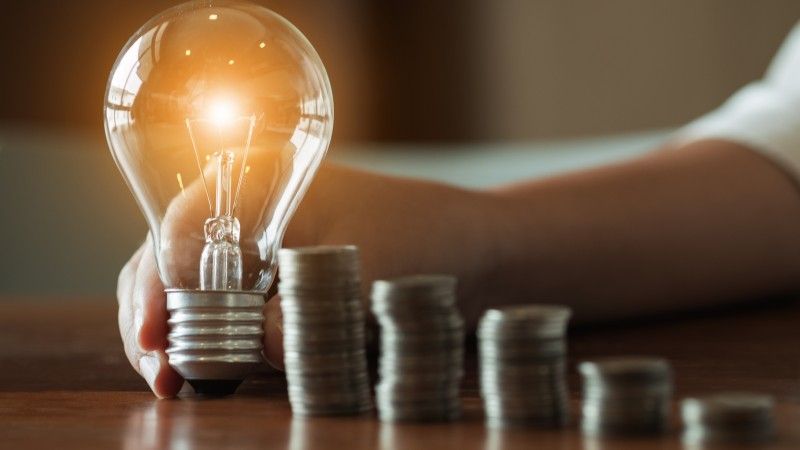 woman-hands-holding-light-bulb-in-working-place-2026-03-26-07-28-00-utc