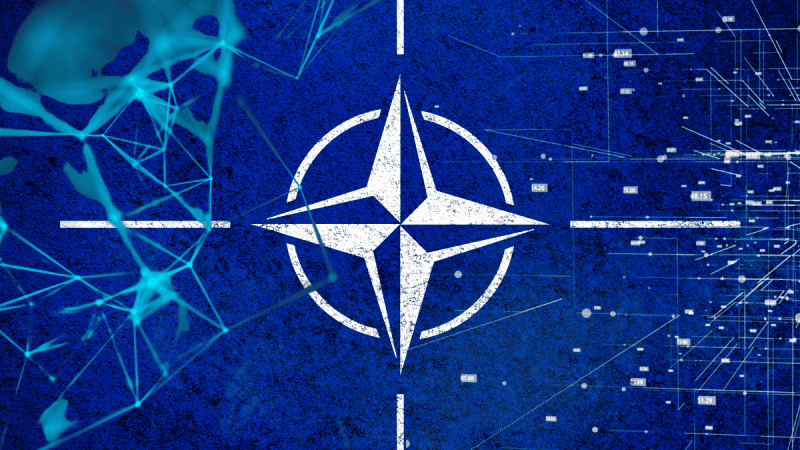 Flaga NATO z cyfrowymi wstawkami.