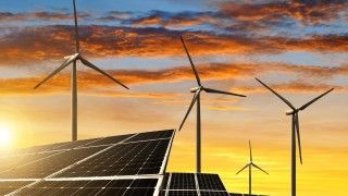 wind-turbines-and-solar-panels-at-sunset-2026-03-24-06-31-00-utc