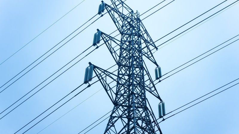 steel-power-pylon-against-pale-blue-sky-2026-03-18-09-56-49-utc