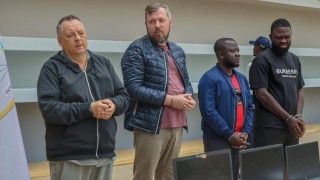 Lev Lakshtanov, left, and Igor Ratchin, second left, who have been sentenced to eight and 11 years respectively, at a hearing in August 2025.