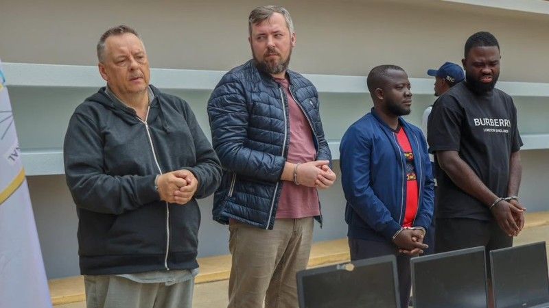 Lev Lakshtanov, left, and Igor Ratchin, second left, who have been sentenced to eight and 11 years respectively, at a hearing in August 2025.