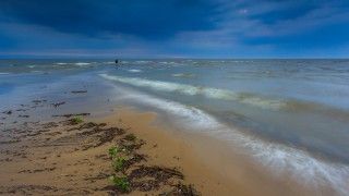 storm-clouds-over-sand-beach-coast-of-baltic-sea-2026-03-26-02-34-26-utc