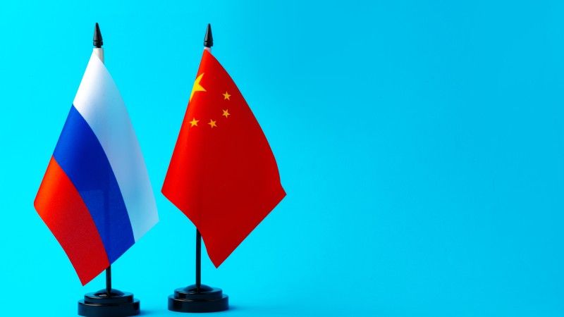 flags-of-russia-and-china-on-blue-background-2026-01-08-05-51-05-utc