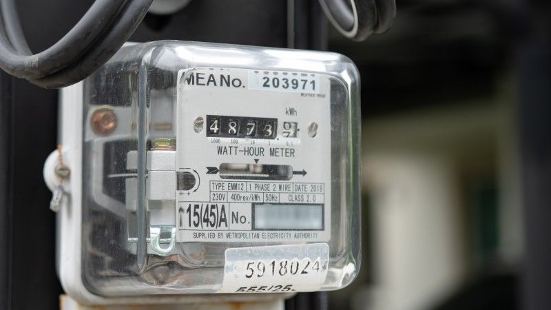 close-up-of-an-analog-electric-meter-on-a-building-2026-08-18-14-23-50-utc