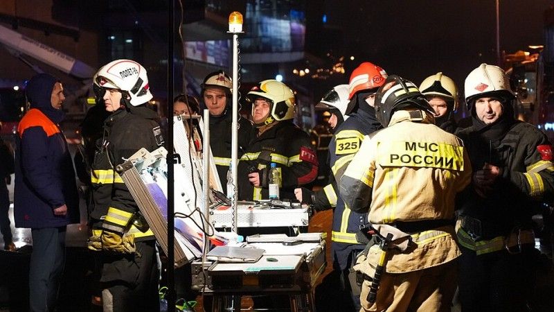 Rescuers at the scene of the terrorist attack on Crocus City Hall in Moscow.