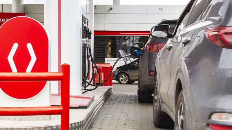 cars-refueling-at-a-brightly-lit-gas-station-2026-09-22-22-40-14-utc