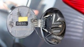 car-diesel-cap-closeup-on-a-silver-car-2026-09-23-23-09-46-utc