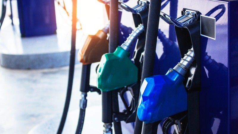 gas-pump-nozzles-at-a-service-station-2026-09-22-19-01-07-utc