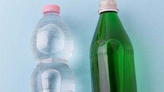 two-different-water-bottles-on-blue-background-2026-09-24-22-20-50-utc