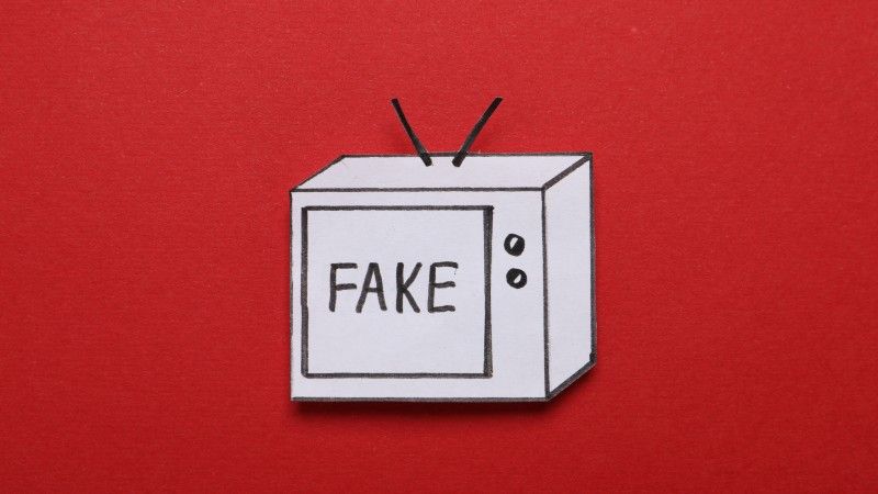 graphical-television-with-fake-message-on-red-back-2026-03-27-01-28-36-utc