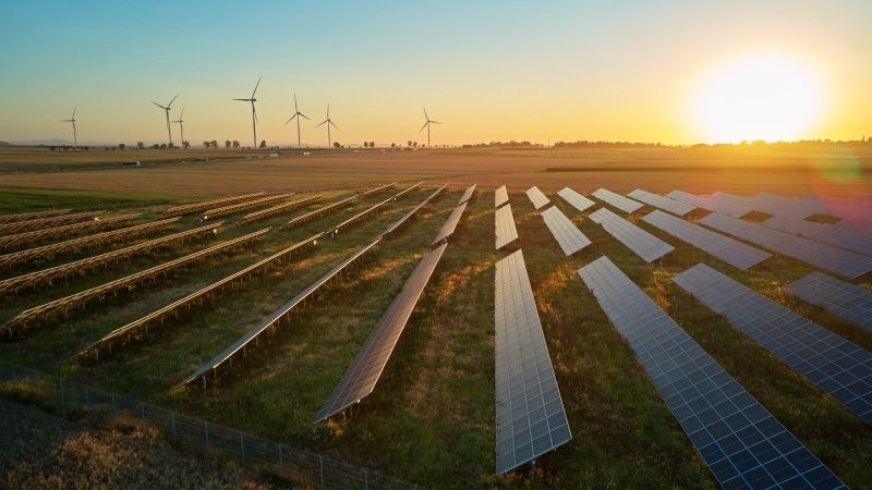 wind-turbines-and-solar-panels-at-sunset-2026-09-23-23-56-10-utc