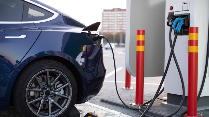 electric-car-charging-at-an-urban-station-2026-09-22-23-42-17-utc