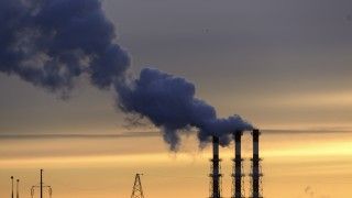 industrial-chimneys-at-golden-hour-pumping-out-blu-2026-09-22-11-57-03-utc