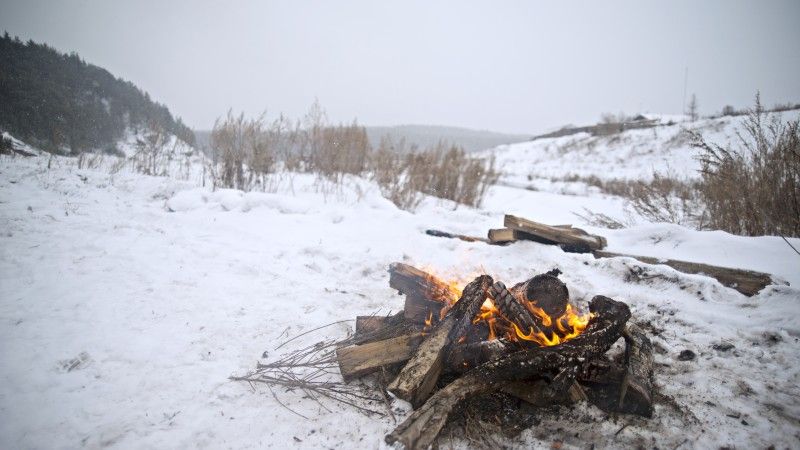 warm-campfire-burning-in-a-snowy-winter-landscape-2026-09-29-11-53-35-utc